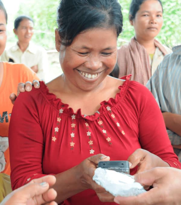 Woman smiling using solar bible